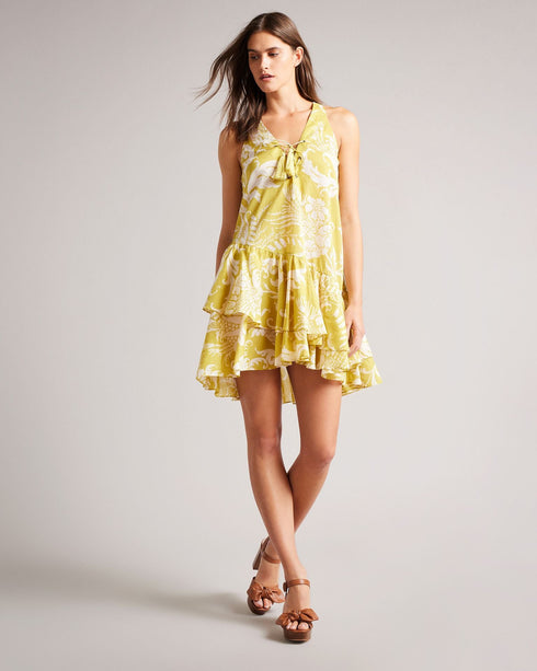 NOEMIY-Swimwear-Things are heating up with NOEMIY. This mini cover-up is adorned with florals and makes the perfect lightweight addition to pop in your suitcase. Throw it on over your swimsuit to grab a cocktail at the bar or for extra coverage when lounging poolside. By choosing Ted Baker cotton products, you're supporting our investment in the Better Cotton Initiative's mission. This product is sourced via a system of mass balance and therefore may not contain Better Cotton. Mini cover up dress 100% Cotto